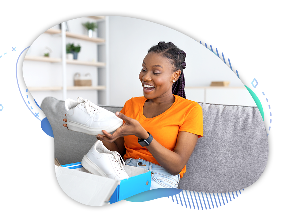 woman opening box with sneakers