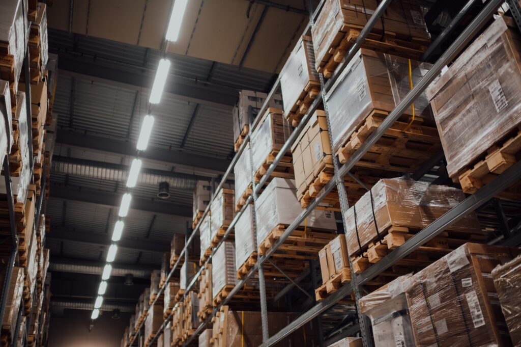 tall shelves with products in fulfillment center